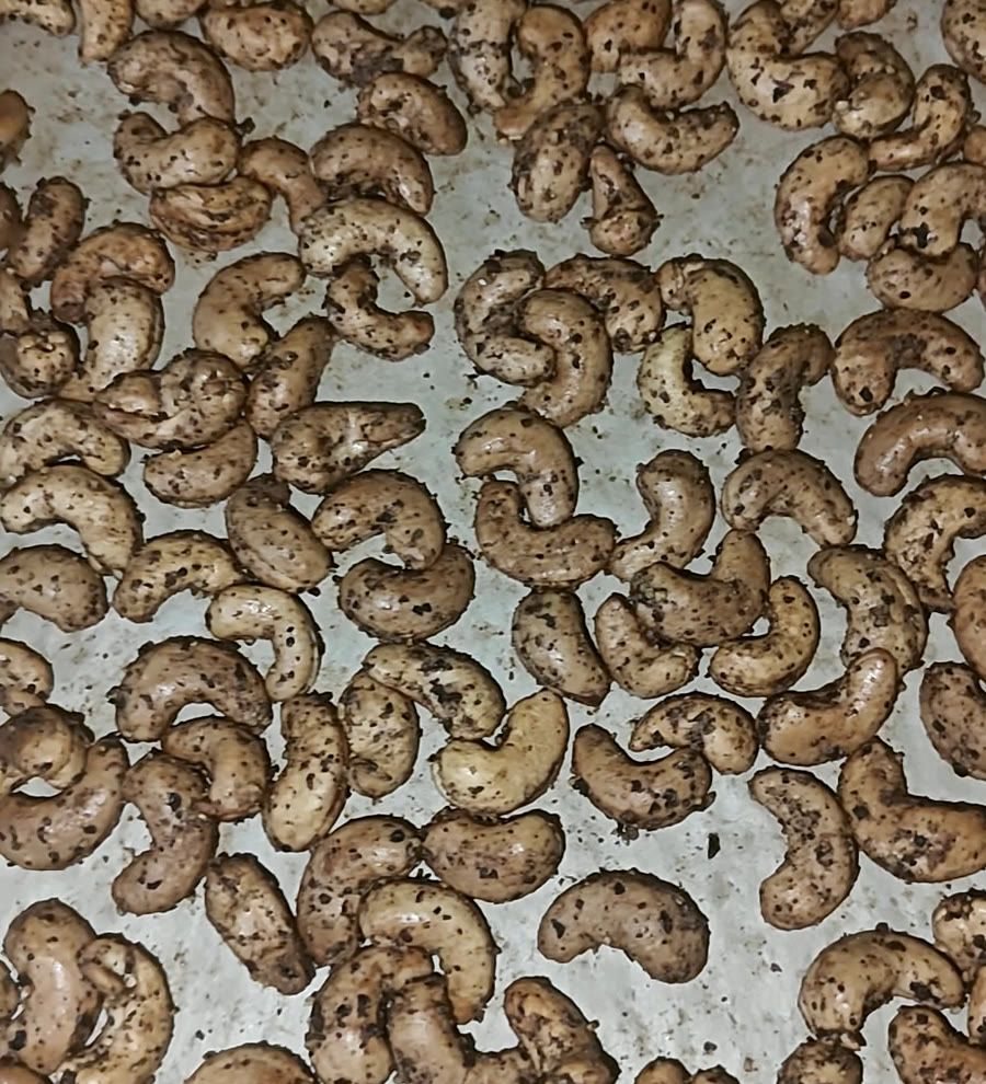 A tray of freshly roasted Black Pepper Cashews